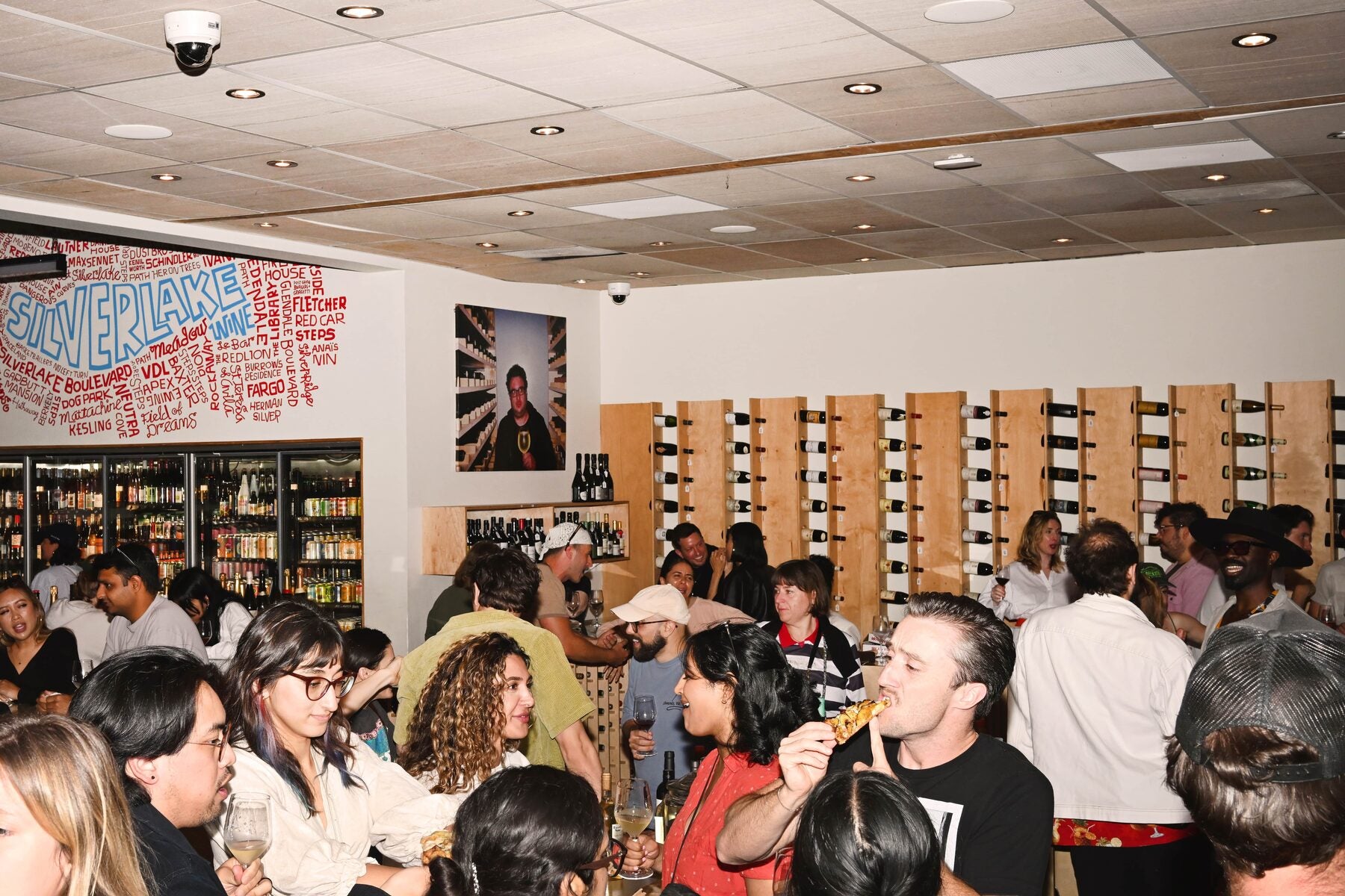 The crowd under the Silverlake Wine mural